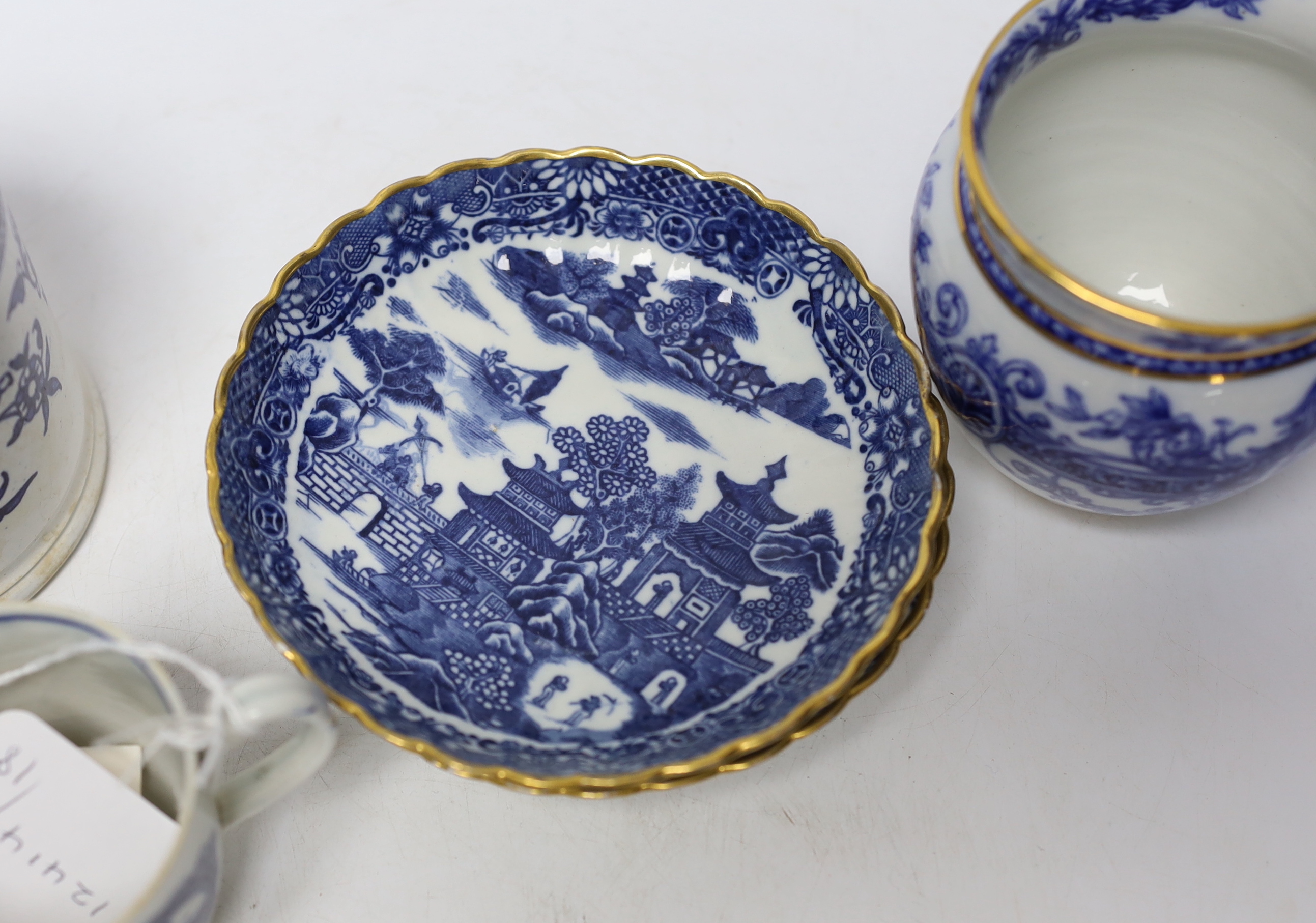 Liverpool, Seth Pennington and John Part, a Porter and Ferryman pattern coffee can, c.1780, together with an early 19th century Pearlware blue and white mug and further blue and white wares (5)
